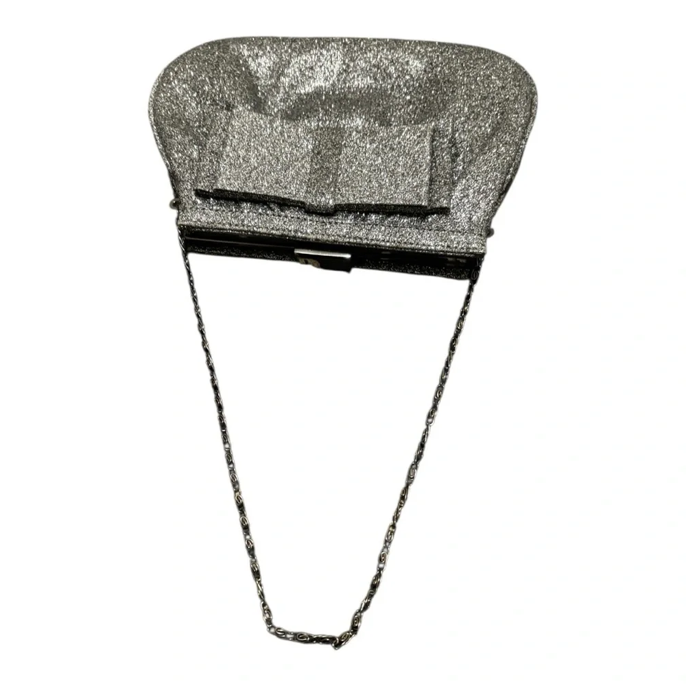 Miss KG Clutch with Chain Strap and a Bow Accent on the Front Silver